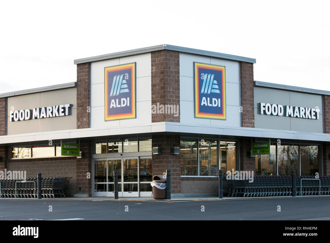 A logo sign outside of a Aldi retail grocery store in Winchester, Virginia on February 13, 2019