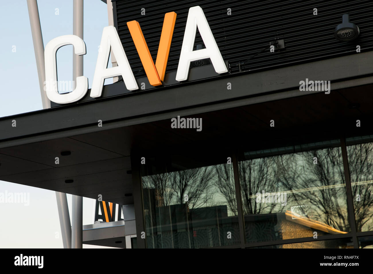 A Logo Sign Outside Of A Cava Restaurant Location In Chantilly