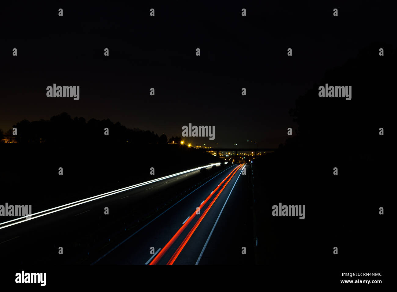 Long exposure Car Light trail at night in the highway Stock Photo - Alamy
