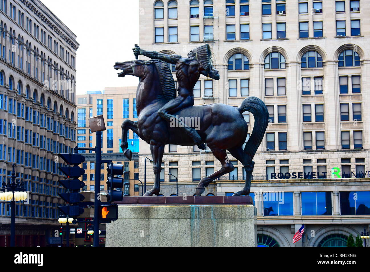 Statue of Native American warrior on horse in downtown Chicago