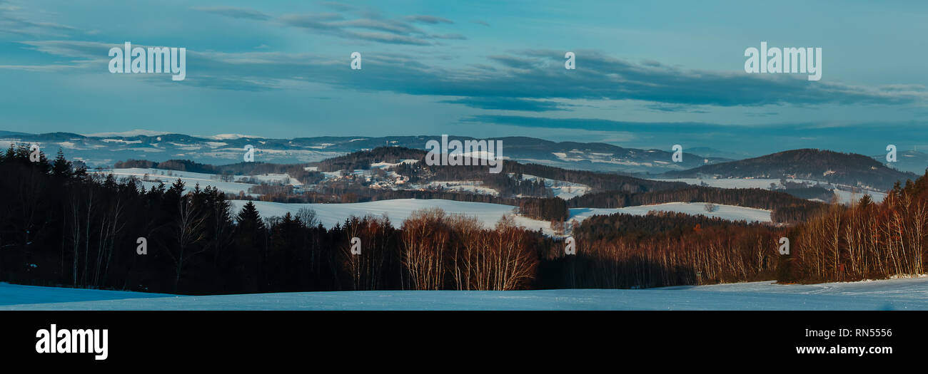 Nice panoramatic Czech winter landscape with hill and trees Stock Photo