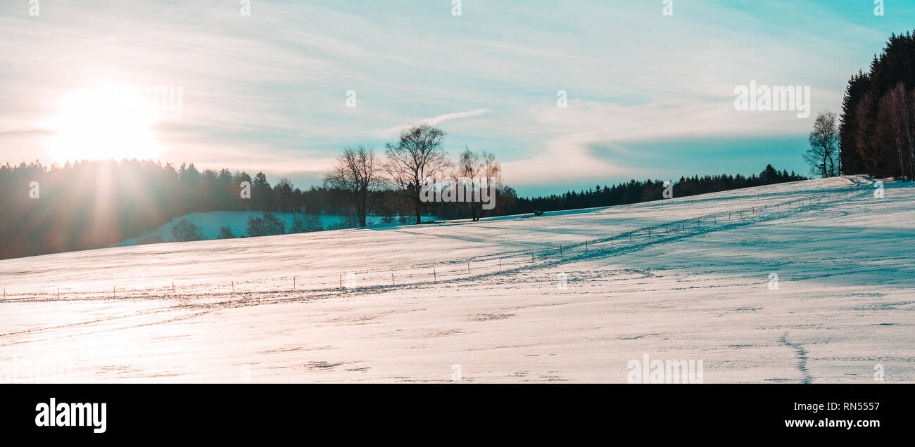 Nice panoramatic Czech winter landscape with sun and trees Stock Photo