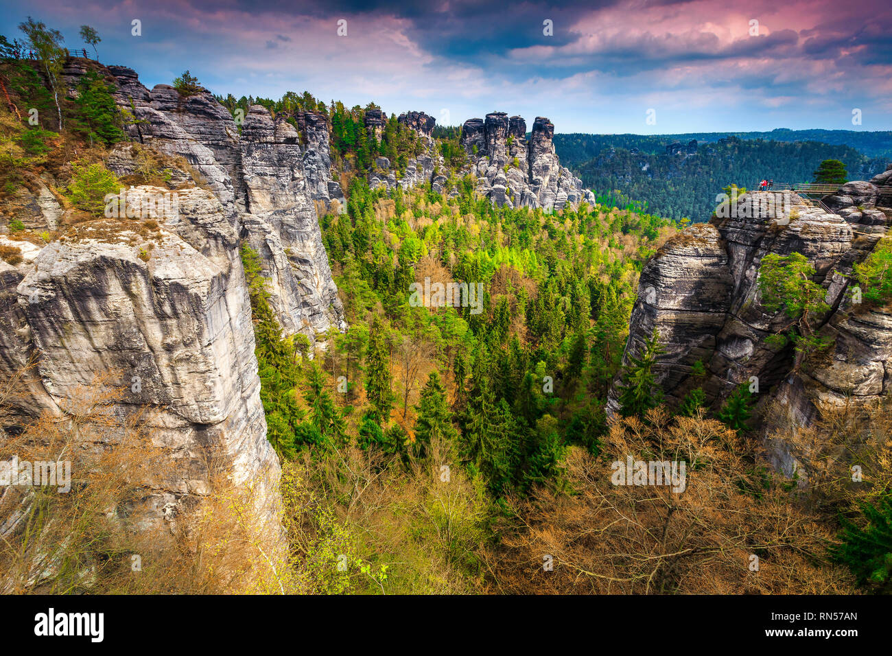 Beautiful travel destination in Saxon Switzerland. Beautiful high rock formations and green forest, Bastei bridge, Germany, Europe Stock Photo