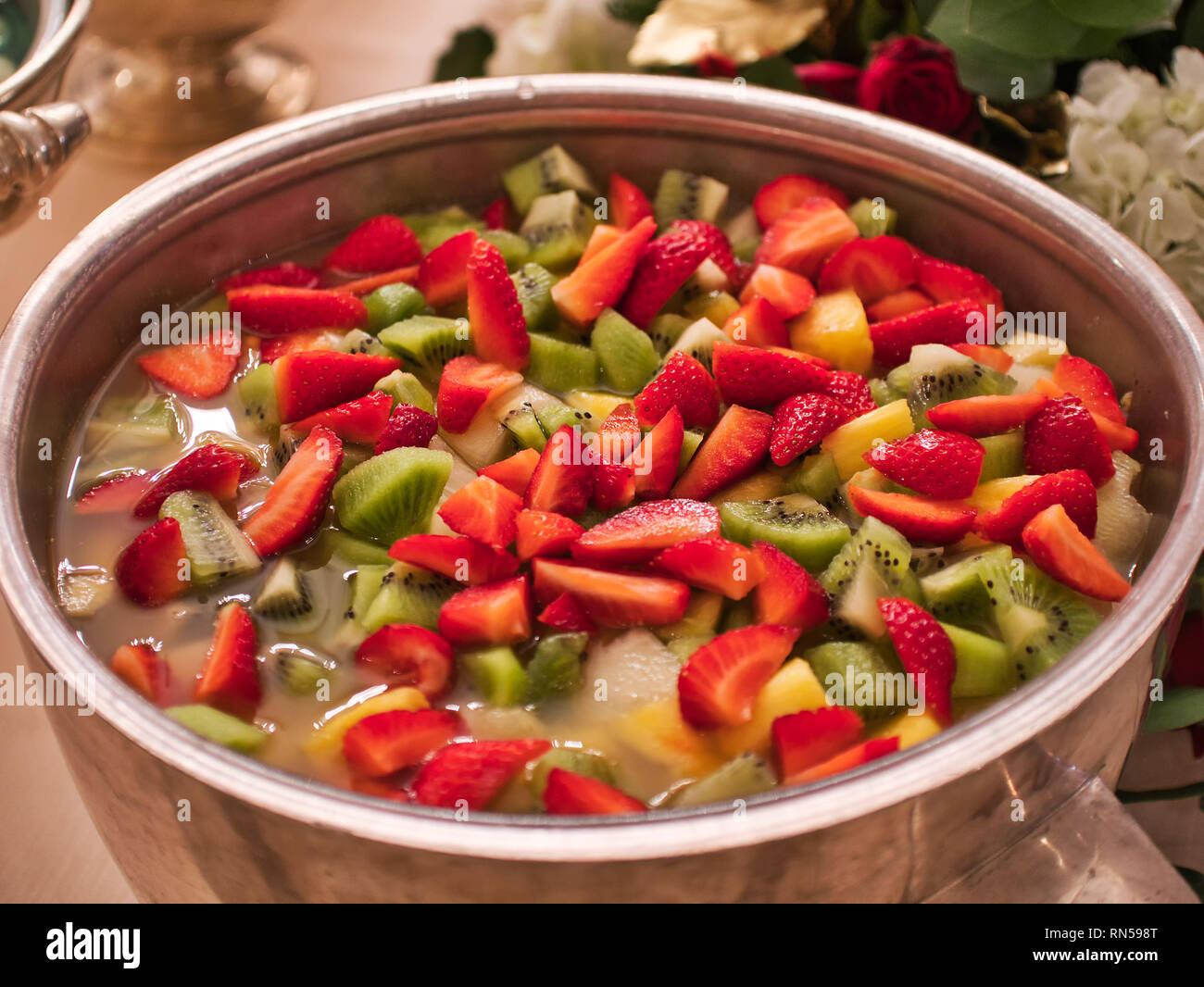 delicious macedonia fruits bowl strawberries kiwis Stock Photo