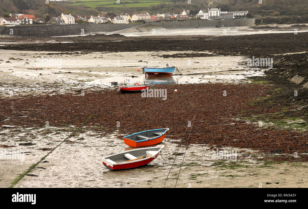 Tide out in a fishing village on the West Coast of Guernsey in the English Channel Islands Stock Photo