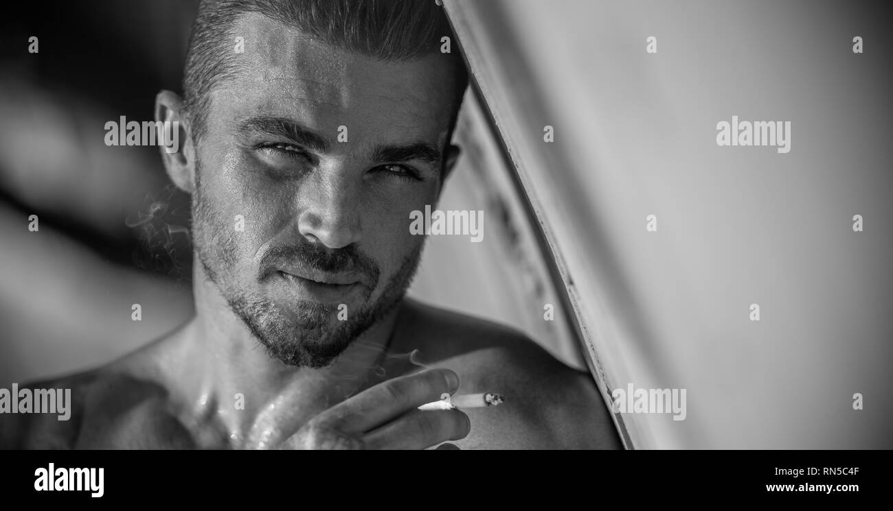 Handsome Caucasian Male Model Posing On The Beach wall Stock Photo Alamy