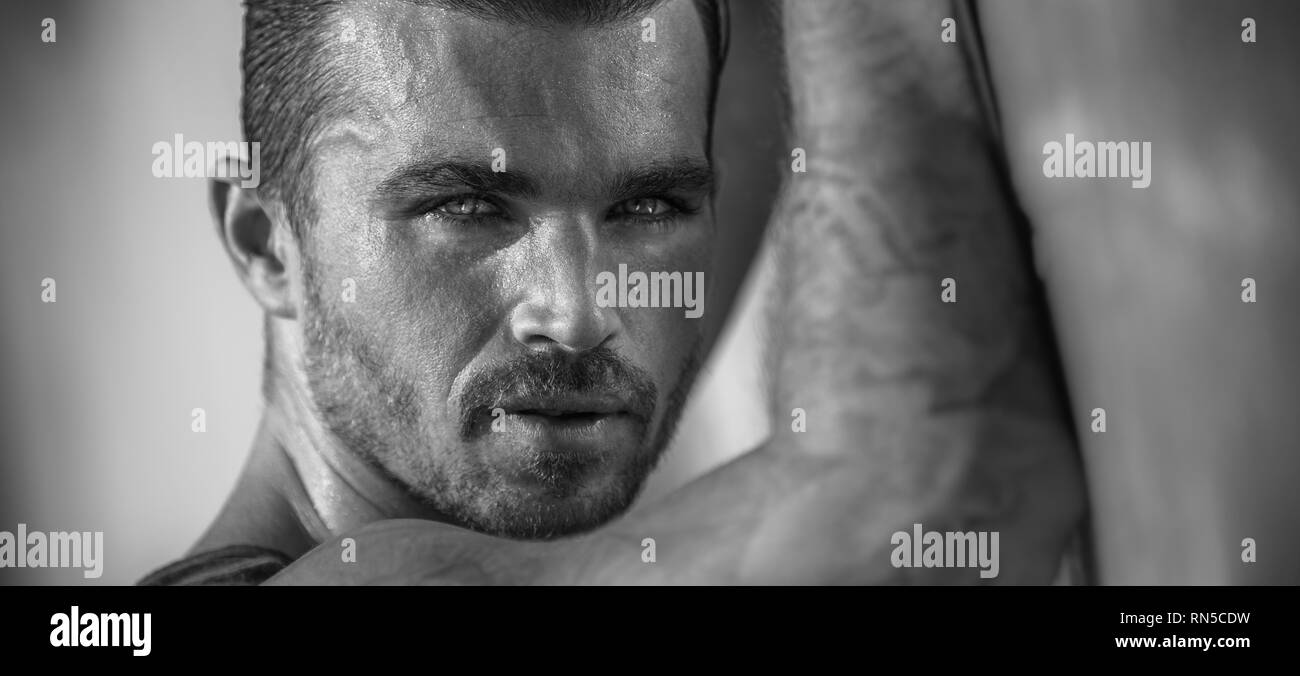 Handsome Caucasian Male Model Posing On The Beach wall Stock Photo Alamy