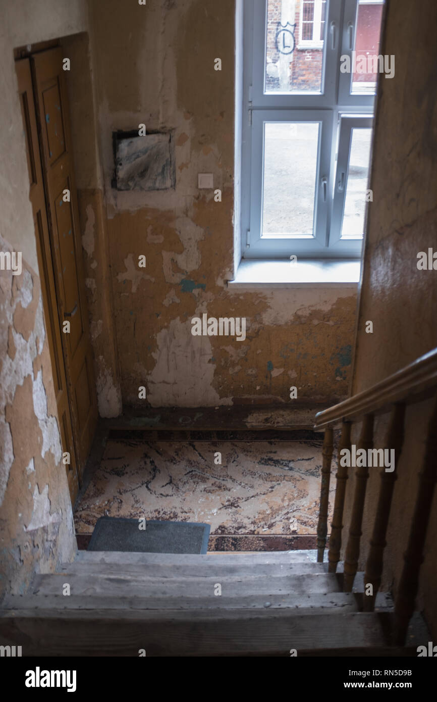 Crumbling interior of apartment building in Warsaw Ghetto tenement house Stock Photo