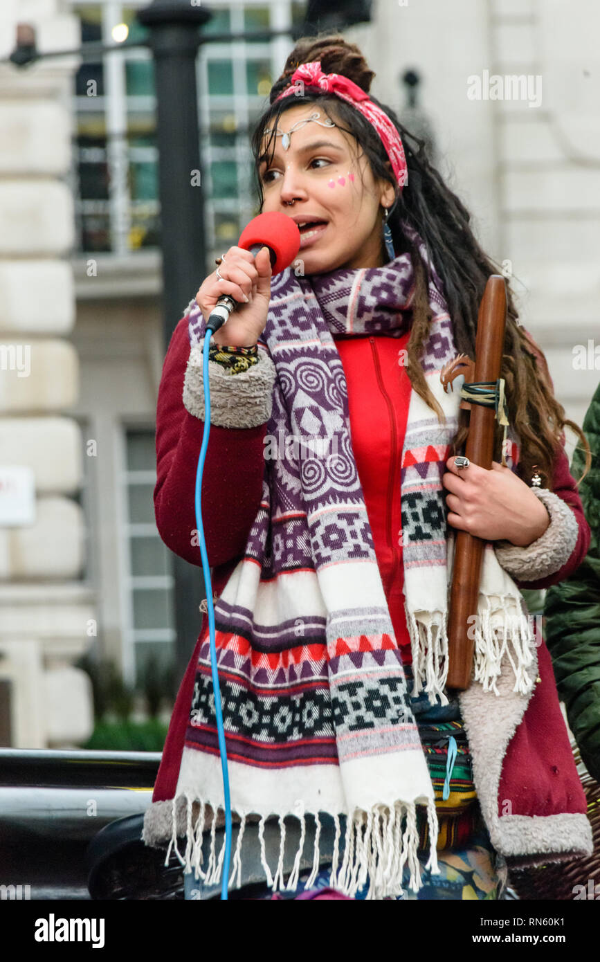 London, UK. 16 February 2019. The 16th 'Reclaim Love' free Valentine's Day street party takes place around the statue of Eros in Piccadilly Circus, with drumming, music, dancing poetry to celebrate love. The event, which was founded by poet Venus CuMara, aims to reclaim love as a manifestation of the human spirit from the sleazy commercialisation which has taken over Valentine's Day as a festival of profit. Credit: Peter Marshall/Alamy Live News Stock Photo