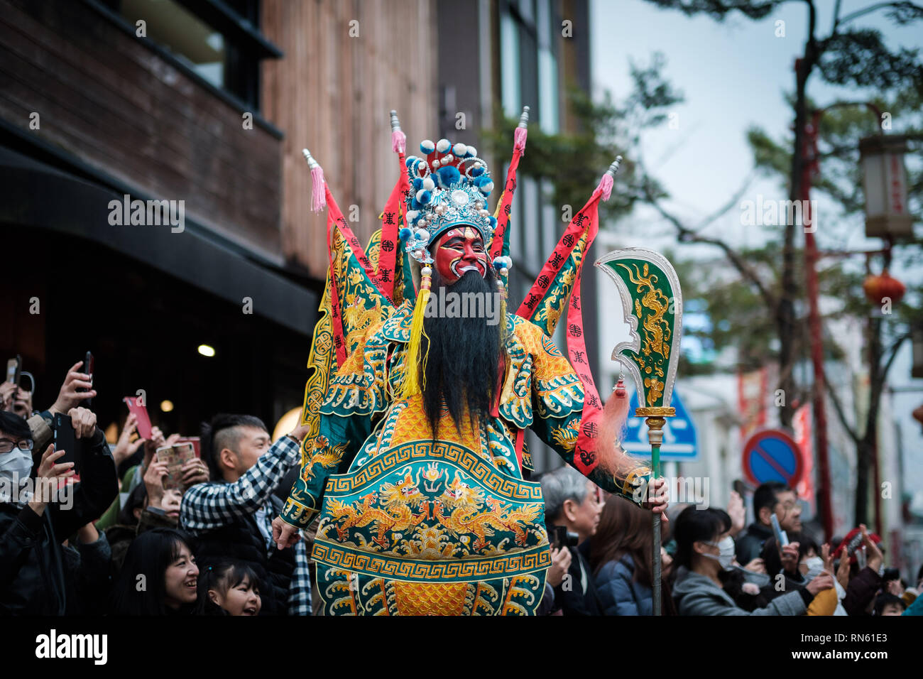 People wearing traditional costume parade in the street of Yokohama's Chinatown on February 16, 2019. Extravagant parade to celebrate the New Year with costumes of the Emperor, ethnic clothing, lion dance, and dragon dance. February 16, 2019 Credit: Nicolas Datiche/AFLO/Alamy Live News Stock Photo