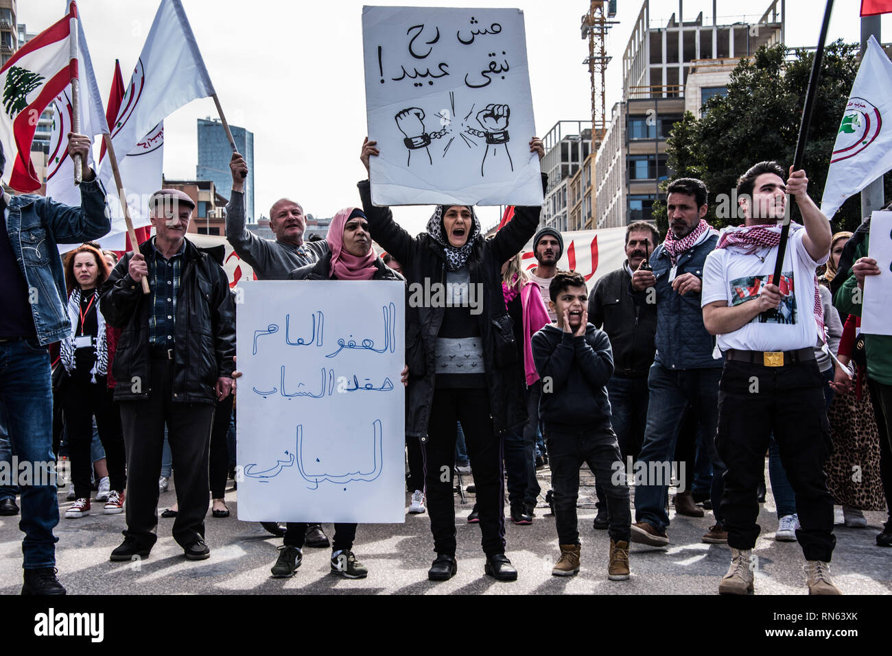 Beirut, Lebanon. 17th Feb, 2019. Citizens march through Beirut in protest of financial inequality and appalling lack of basic public services in Lebanon. Calling for a non-secular government structure, decent public services and an end to corruption, they say they will be coming out every two weeks to peacefully put pressure on a status quo that has been unbearable for too long. Beirut, Lebanon, 17 February 2019. Credit: Elizabeth Fitt/Alamy Live News Stock Photo