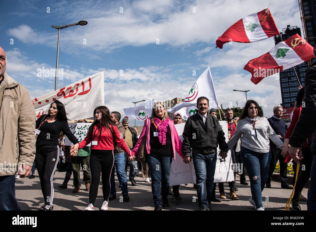Beirut, Lebanon. 17th Feb, 2019. Citizens march through Beirut in protest of financial inequality and appalling lack of basic public services in Lebanon. Calling for a non-secular government structure, decent public services and an end to corruption, they say they will be coming out every two weeks to peacefully put pressure on a status quo that has been unbearable for too long. Beirut, Lebanon, 17 February 2019. Credit: Elizabeth Fitt/Alamy Live News Stock Photo