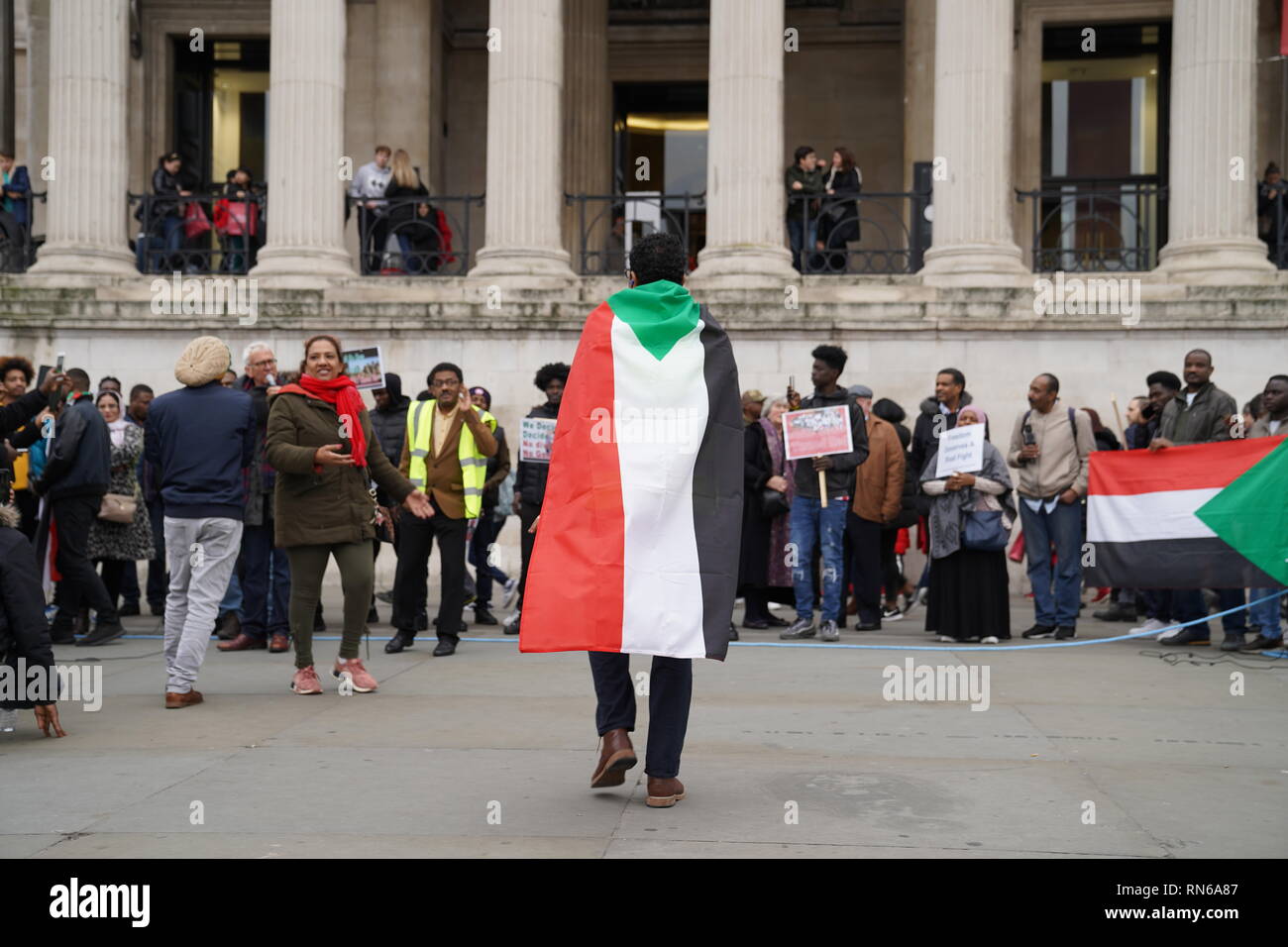 Trafalgar Square, London, UK. 16th Feb 2019. Photograph taken in central London during a protest organised by the Sudanese population in the UK in order to overthrow the Sudanese regime which has reigned for about 30 years causing civil upheaval and genocides mostly in the South Sudan which now holds its independence. The county overall has suffered from justice ranging from hyperinflation to unlawful imprisonment. Credit: Ioannis Toutoungi/Alamy Live News Stock Photo