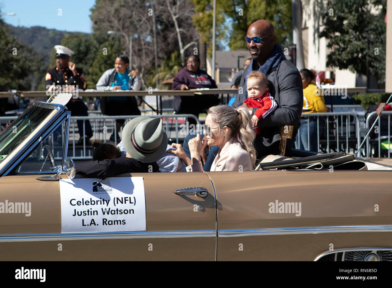 Pasadena, Los Angeles County, California, USA. 16th Feb 2019. - 37th Annual Black History Parade and Festival which celebrates Black Heritage and Culture. The community and surrounding cities joined the celebration by participating and watching the parade which had celebrities, politicians, activists, clubs and children of all ages from different school levels. Celebrity NFL Justin Watson Los Angeles Rams Credit: Jesse Watrous/Alamy Live News Stock Photo
