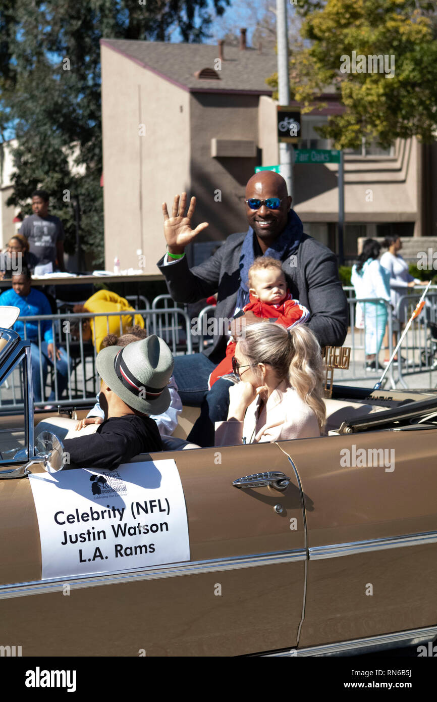 Pasadena, Los Angeles County, California, USA. 16th Feb 2019. - 37th Annual Black History Parade and Festival which celebrates Black Heritage and Culture. The community and surrounding cities joined the celebration by participating and watching the parade which had celebrities, politicians, activists, clubs and children of all ages from different school levels. Celebrity NFL Justin Watson Los Angeles Rams Credit: Jesse Watrous/Alamy Live News Stock Photo