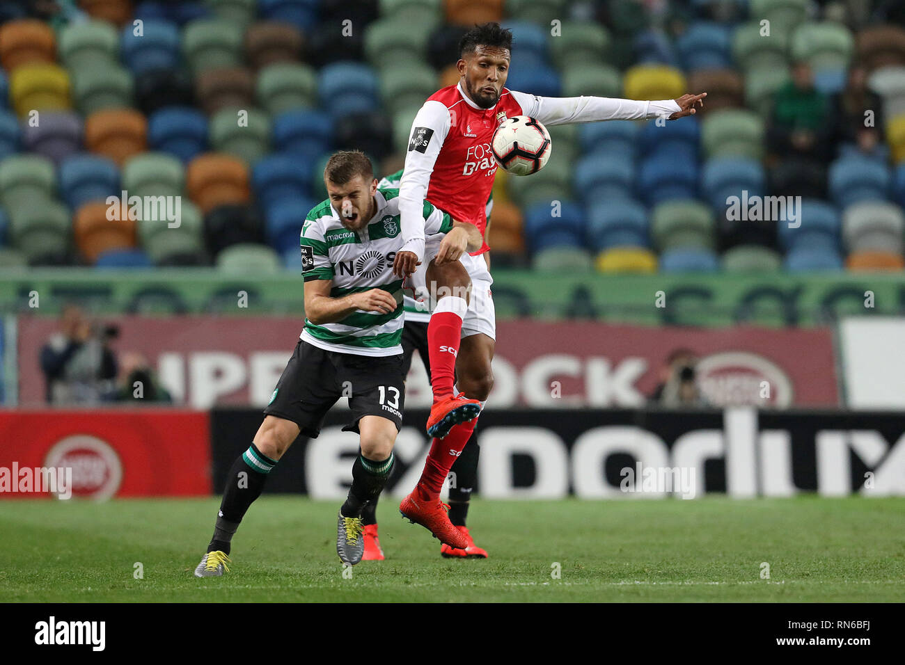 Lisbon, PORTUGAL, Portugal. 17th Feb, 2019. Stefan Ristovski of Sporting CP (L) vies for the ball with Dyego Sousa of SC Braga (R) during the League NOS 2018/19 footballl match between Sporting CP vs SC Braga. Credit: David Martins/SOPA Images/ZUMA Wire/Alamy Live News Stock Photo