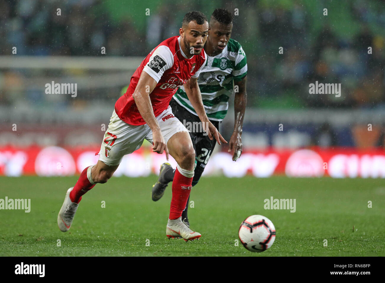 Lisbon, PORTUGAL, Portugal. 17th Feb, 2019. Fransérgio of SC Braga (L) vies for the ball with CristiÃ¡n Borja of Sporting CP (R) during the League NOS 2018/19 footballl match between Sporting CP vs SC Braga. Credit: David Martins/SOPA Images/ZUMA Wire/Alamy Live News Stock Photo