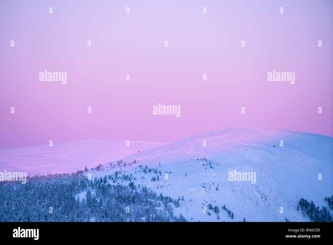Detail of snow covered fells during sunset in Äkäslompolo, Finland Stock Photo