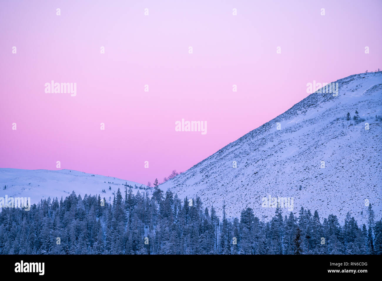 Detail of snow covered fells during sunset with copy space in Äkäslompolo, Finland Stock Photo