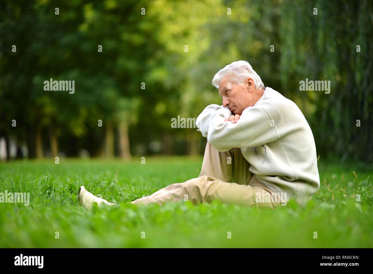 Senior guy in white hi-res stock photography and images - Alamy
