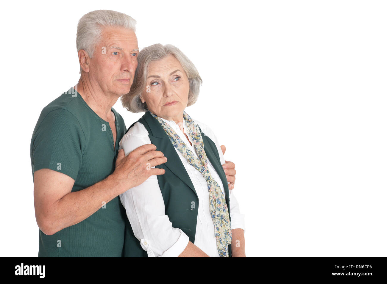 Portrait of thinking senior couple on white background Stock Photo