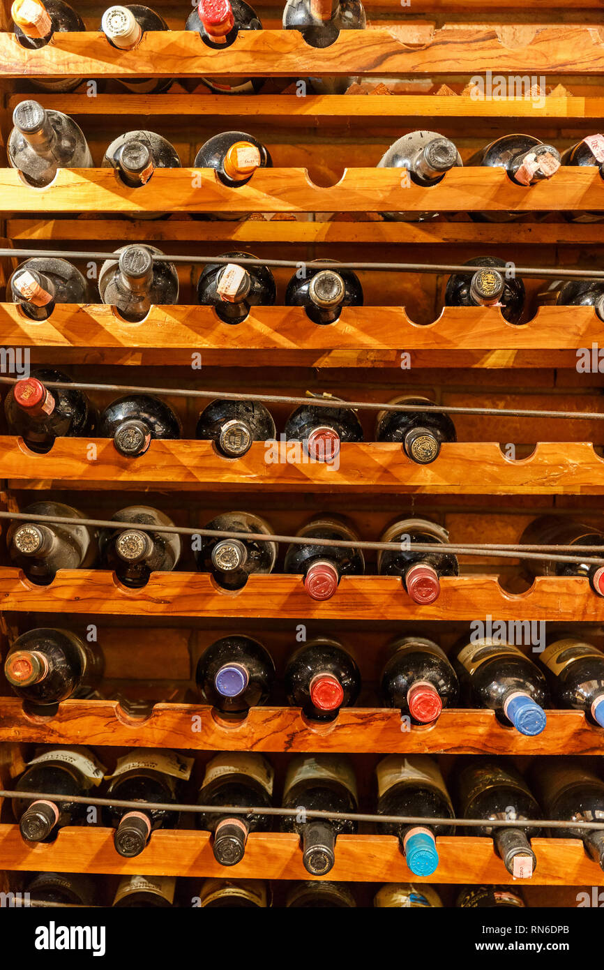 Stored wine bottles in shelves Stock Photo Alamy