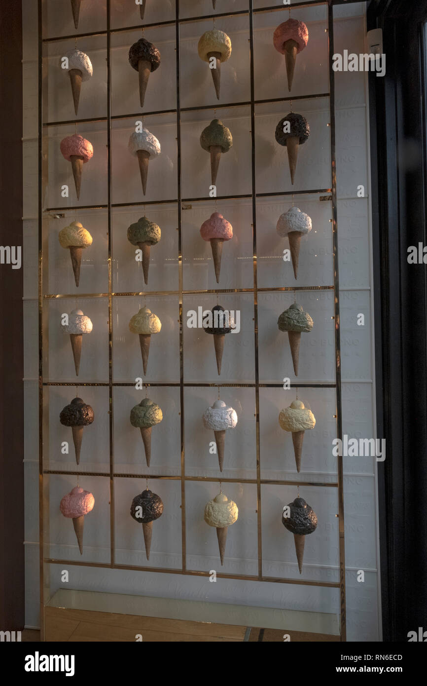 A display of side-lit gelato ice cream cones inside Velchi, a chocolate and gelato shop adjacent to Union Square Park in lower Manhattan, New York Cit. Stock Photo