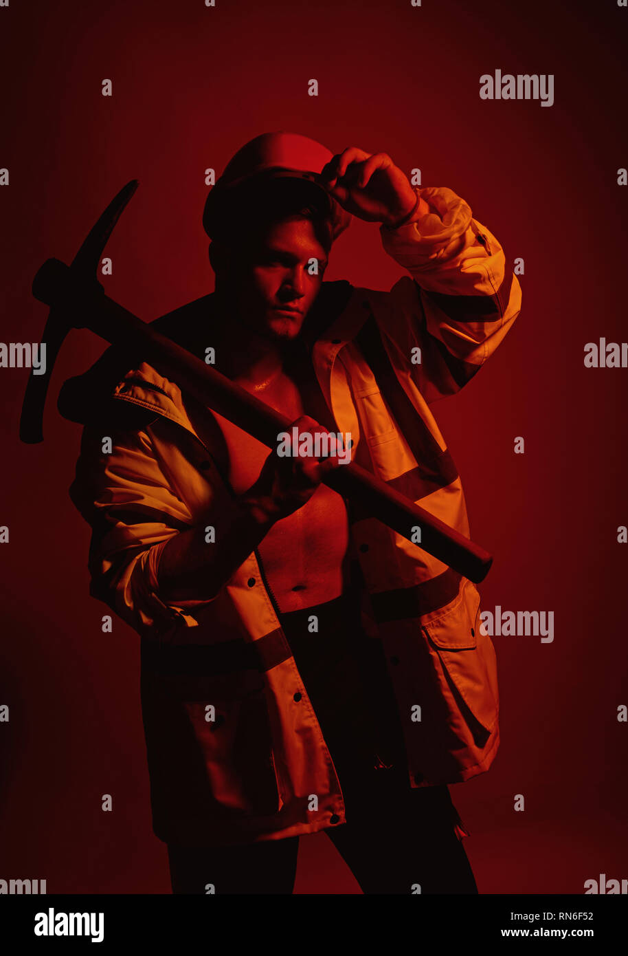 Structures under construction. Muscular man worker. Construction worker ...