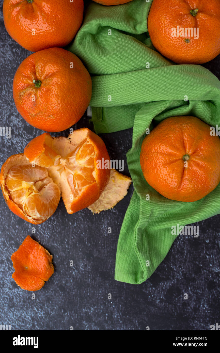 Tangerine (Mandarin) on a dark background Stock Photo