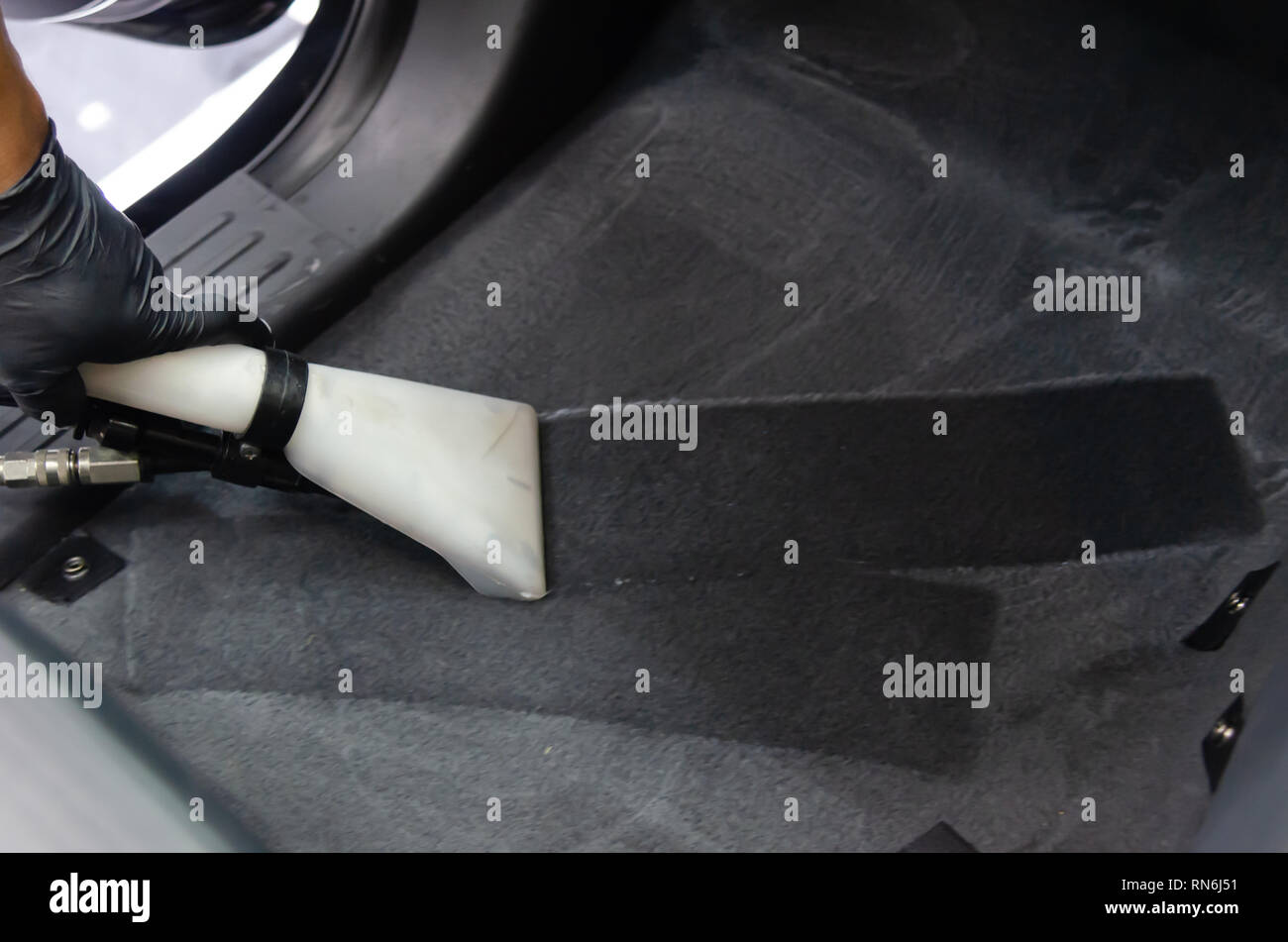 Wash the car carpet.Detailing on interior of modern car Stock Photo Alamy