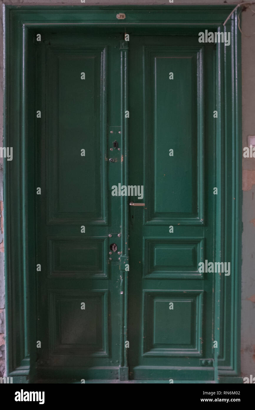 double doors painted green Stock Photo