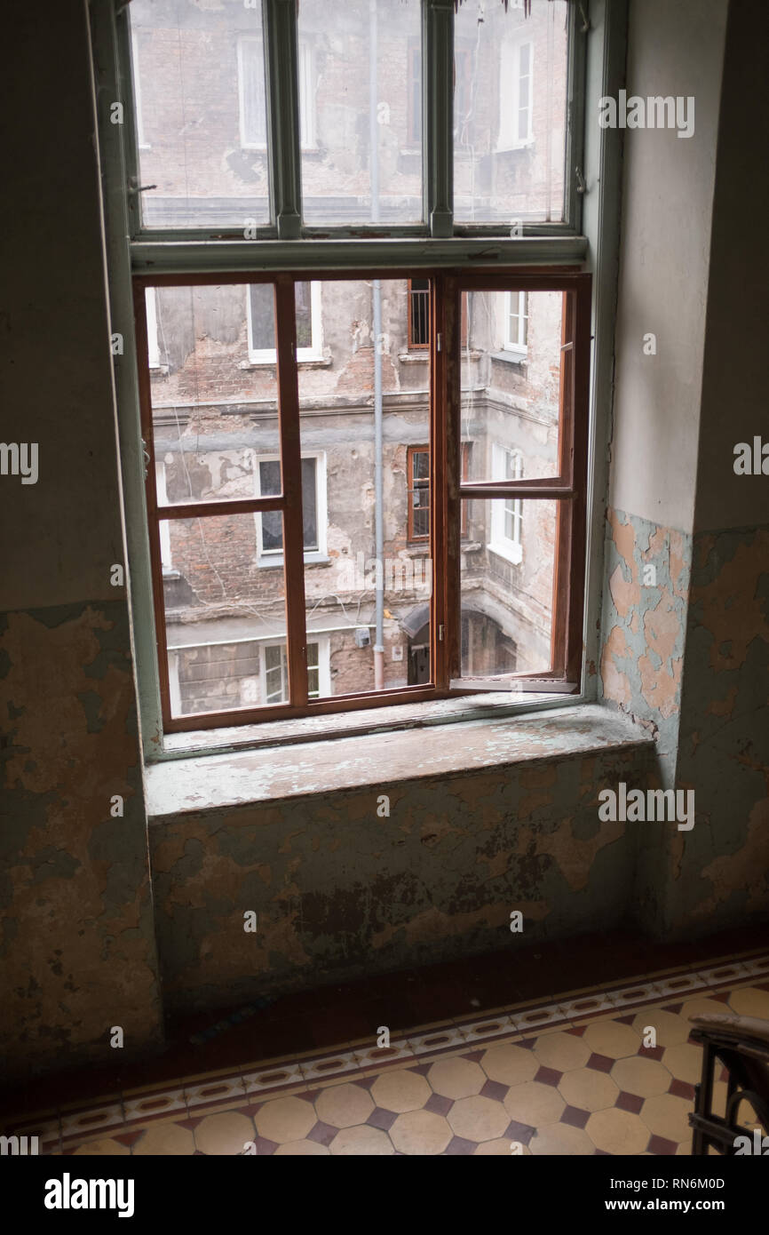 view through a tenement blocks window of a tenement block in Poland Stock Photo