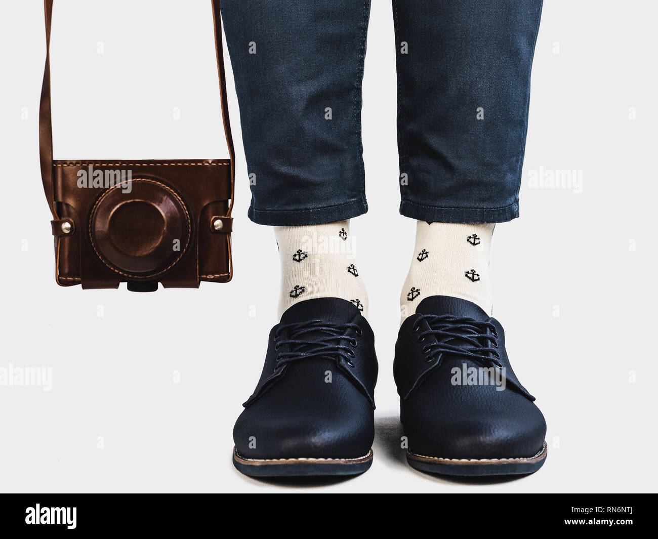 Office Manager, stylish shoes, vintage camera and bright socks. White ...