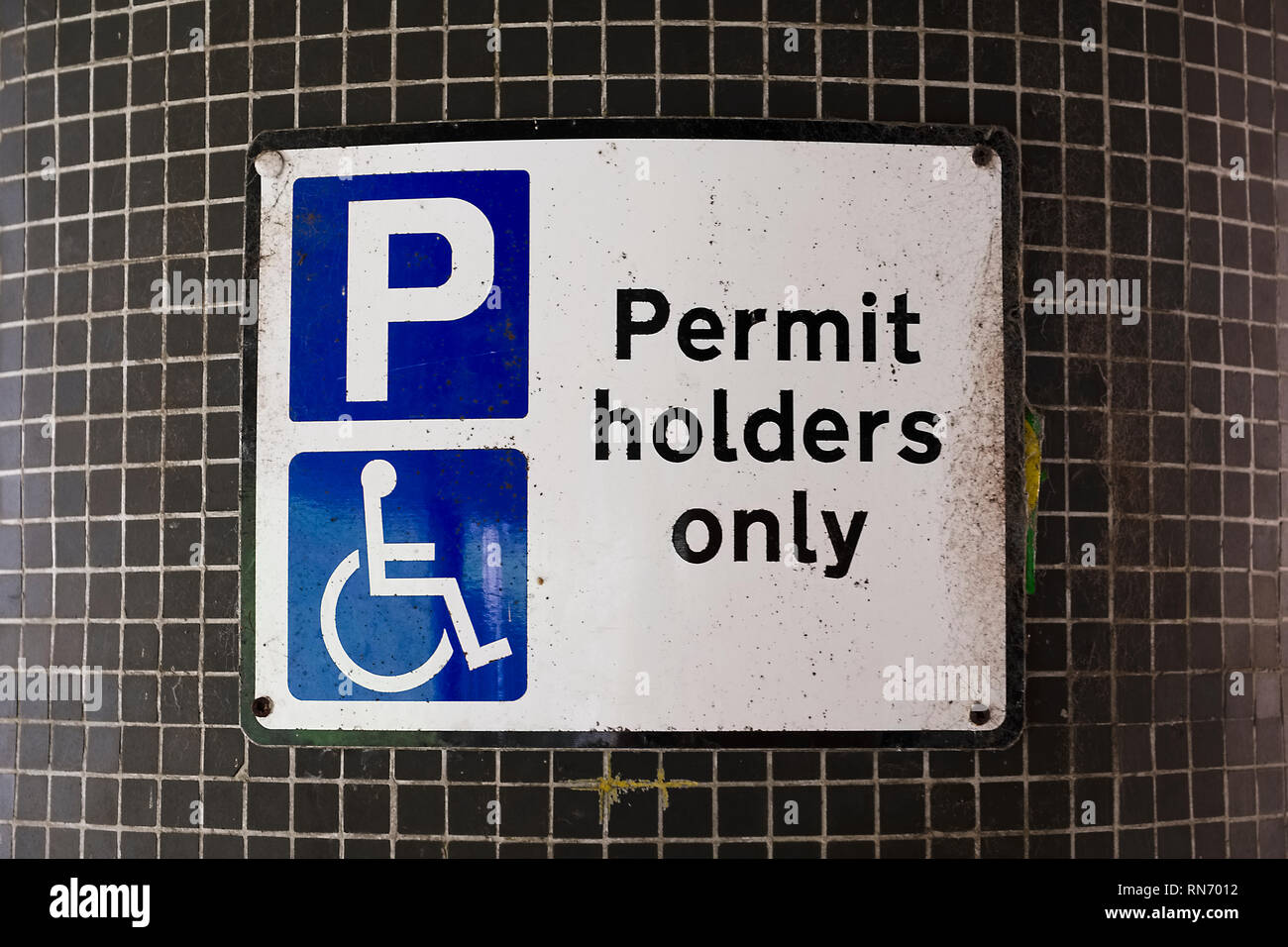 Disabled Badge Holders Only at Car Park Sign Post Stock Photo Alamy