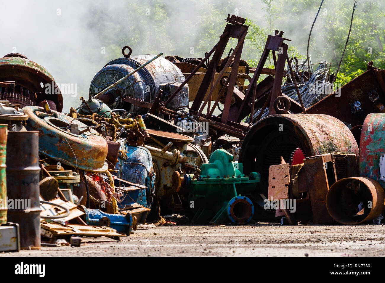 Illegal garbage dump. Large pile of metal waste. The concept of ecology pollution. Stock Photo