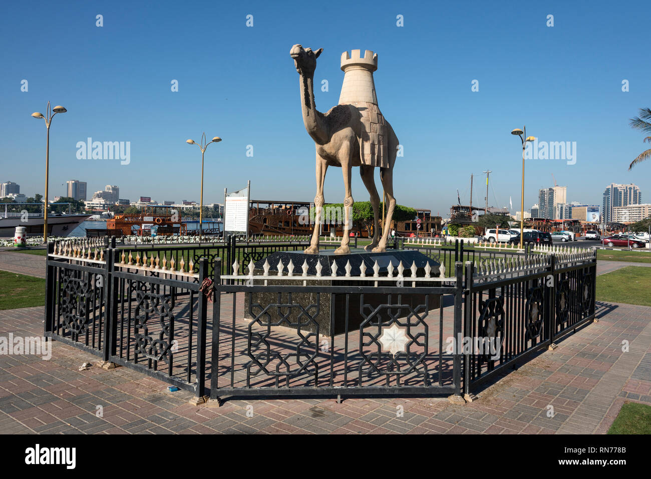 One of the Arabian camel statues in a small park close to the Dubai Creek and the Dubai Municipality on  Baniyas Rd in Deira, Dubai in the United Arab Stock Photo