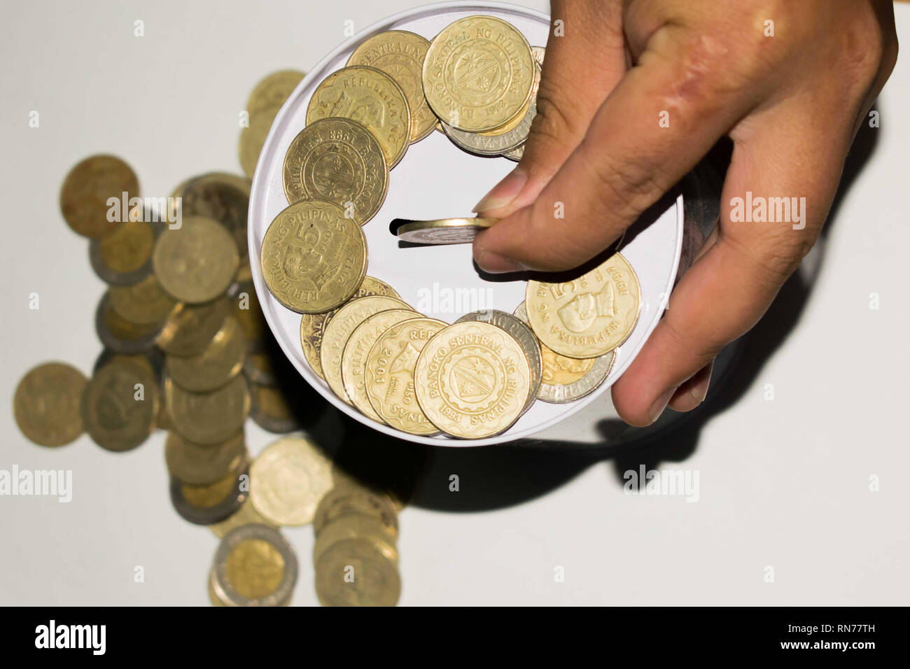 Philippine peso coins hi-res stock photography and images - Alamy