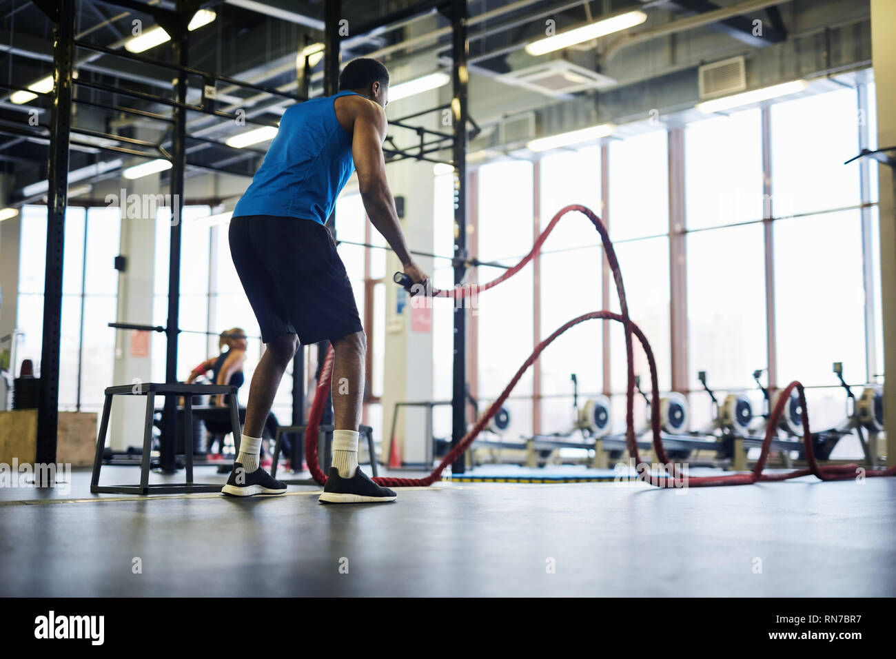 Rope battle in gym Stock Photo - Alamy