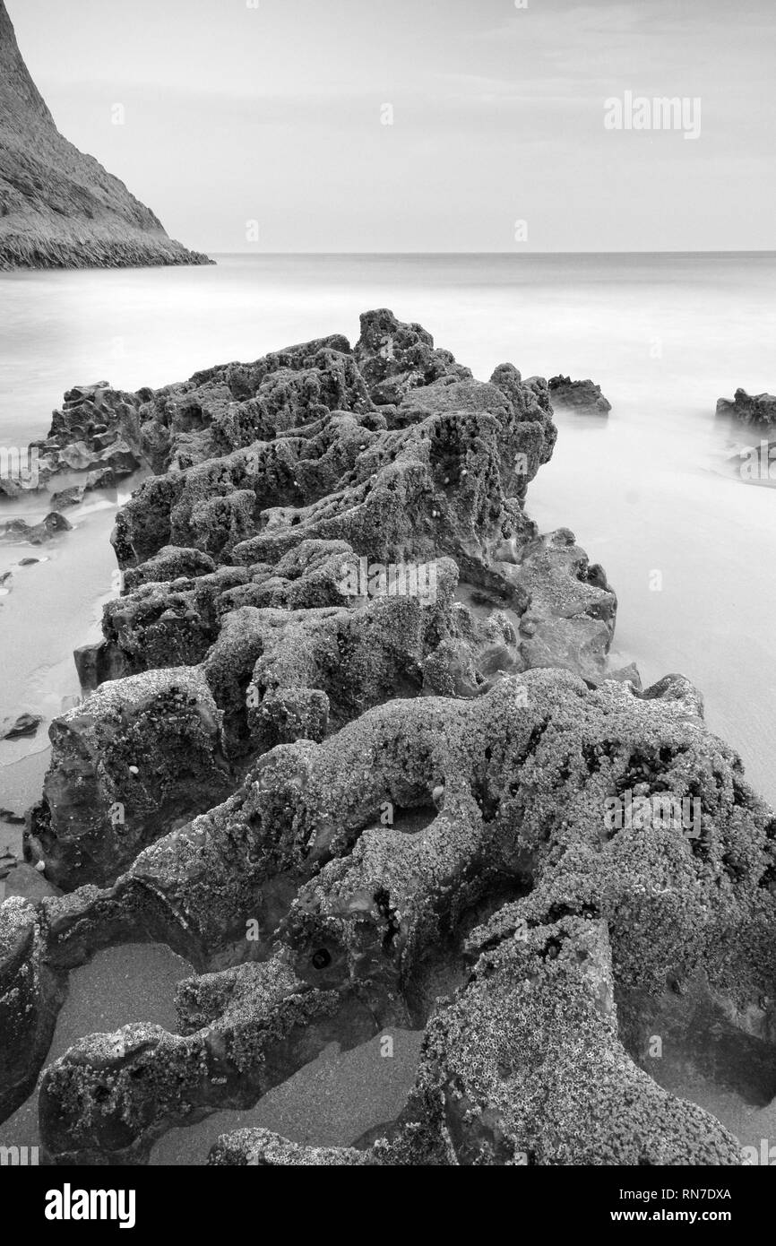 Long exposure black and white image taken at Mewslade, Gower, Wales, UK. Stock Photo
