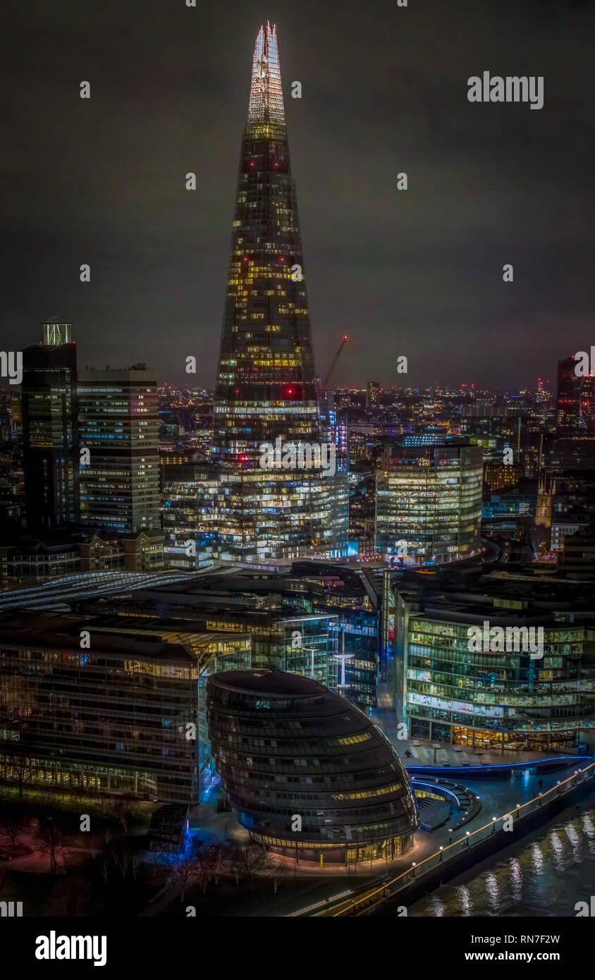 Night drone shot of The Shard and of London City Hall. Stock Photo