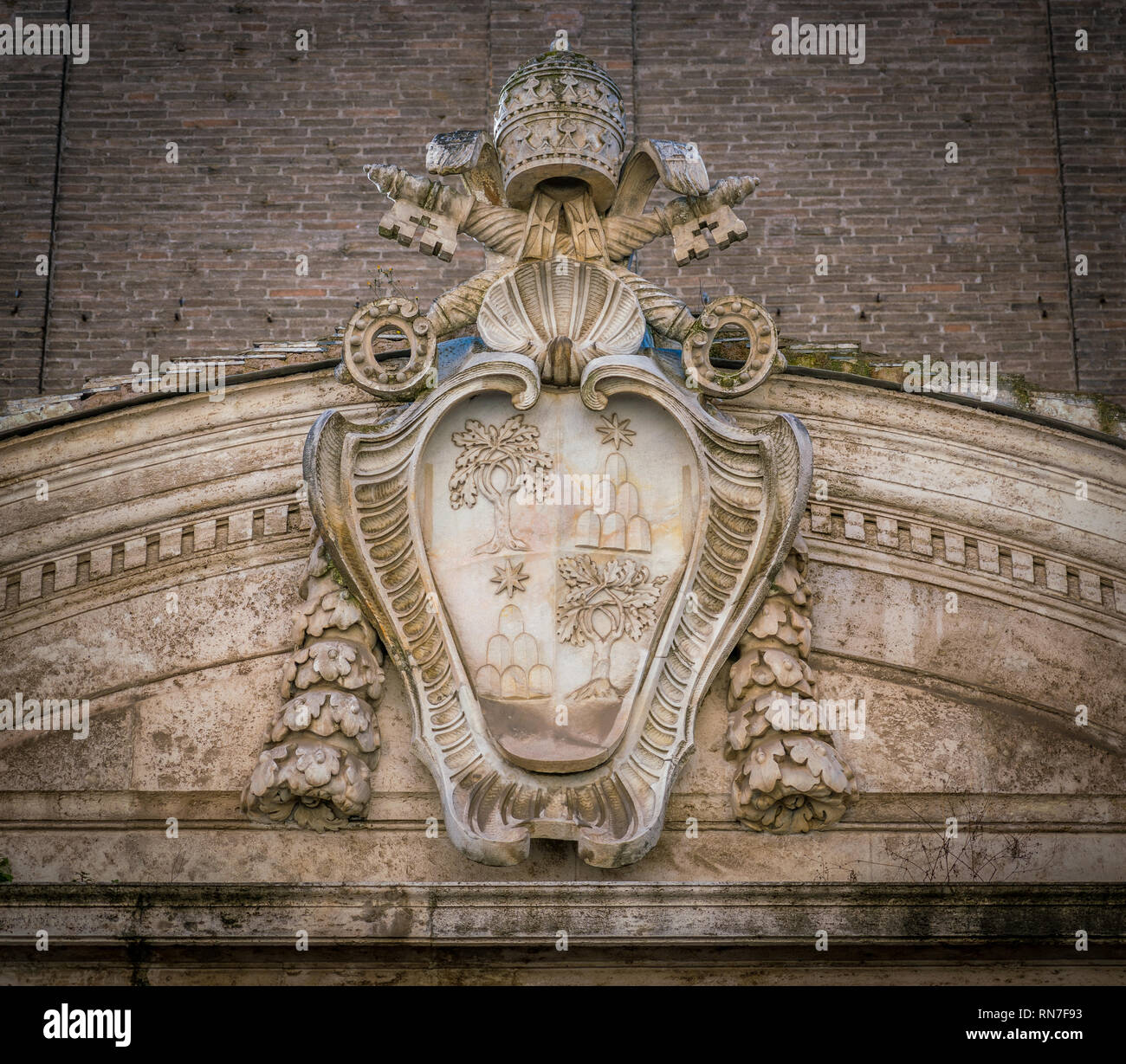 Alexander VII coat of arms on the exterior of the Church of Santo Spirito in Sassia. Rome, Italy. Stock Photo