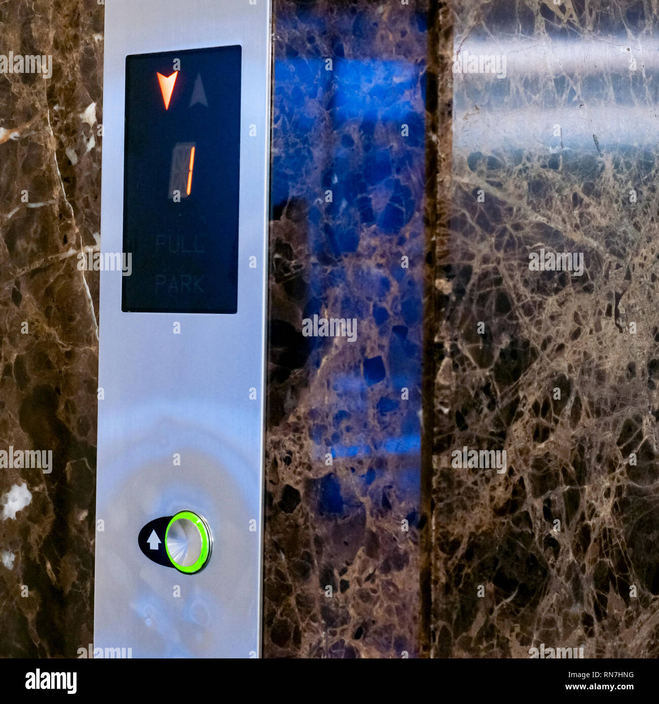 Elevator Button up and down direction. Screen with floor number. Elevator driving direction. Selective focuse Stock Photo