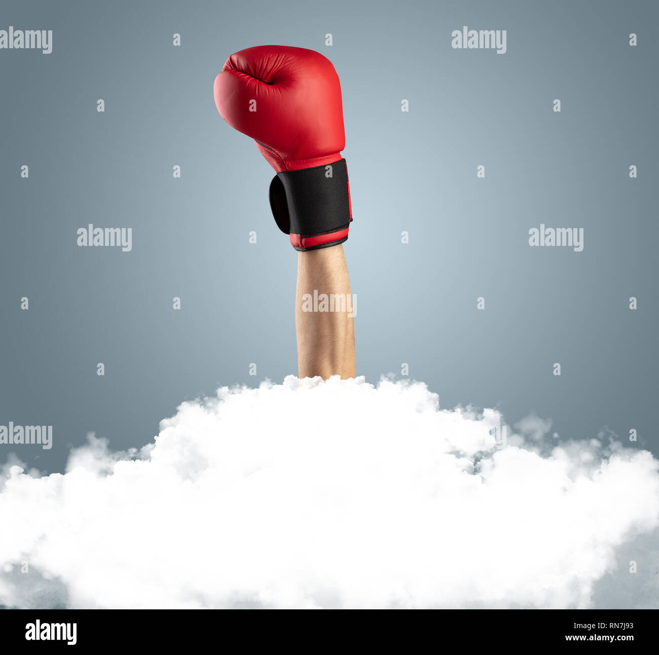 Hand breaking out from the cloud Stock Photo Alamy