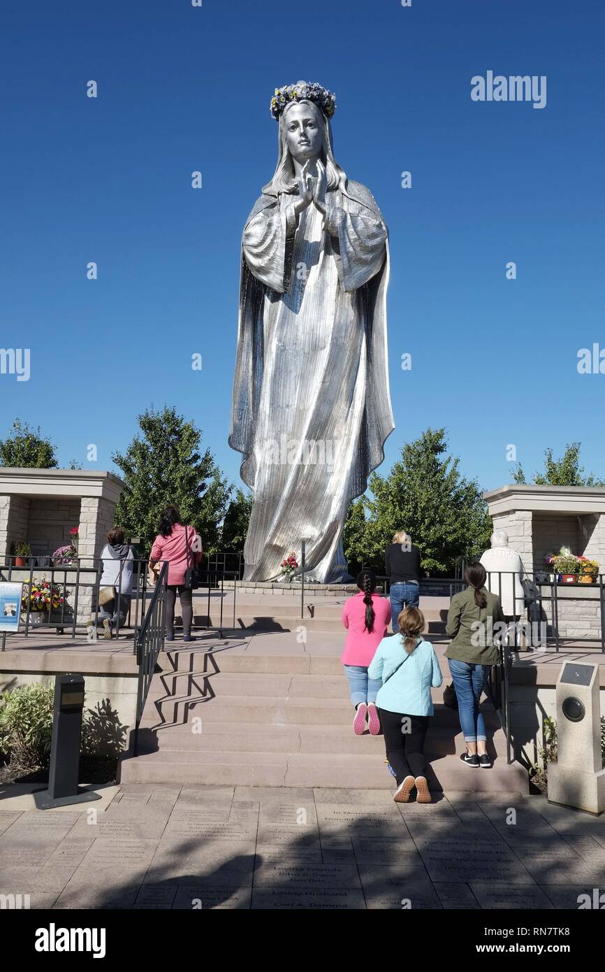 Visitors to The Shrine of Christ’s Passion are met by a 33 foot tall stainless steel statue of “Our Lady of the new Millennium”. The statue is easily seen from U.S. Route 41 as vehicles travel north and south through St. John, Indiana. The 30 acre shrine is a multimedia display, located approximately 35 miles south and east of Chicago, and is the culmination of a 10 year project which cost 10 million dollars. Stock Photo