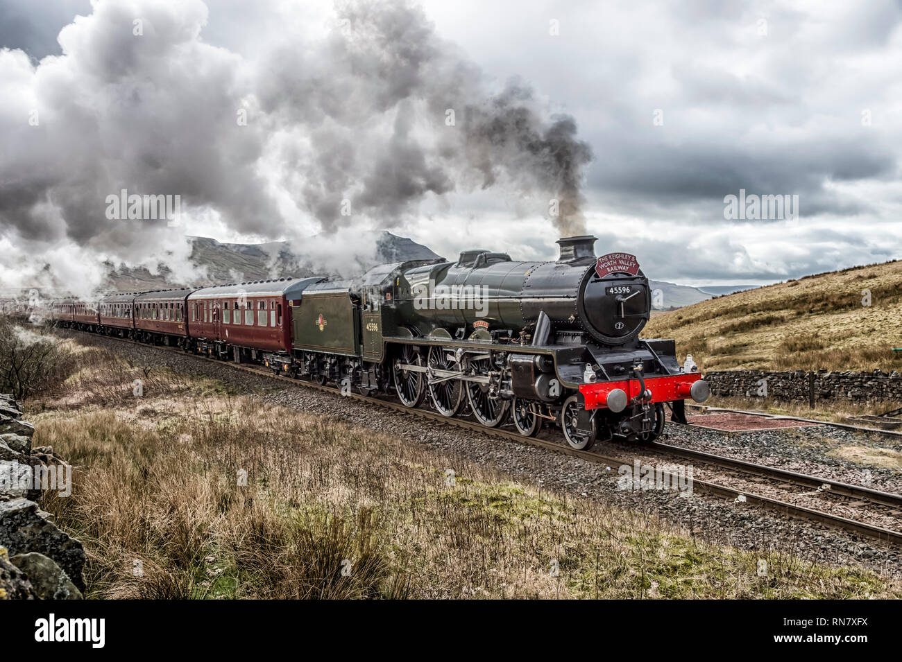 LMS Class 6P, 4-6-0 no 45596 Bahamas nostalgia steam train excursion approaching Blea Moor in the North Yorkshire Dales Stock Photo