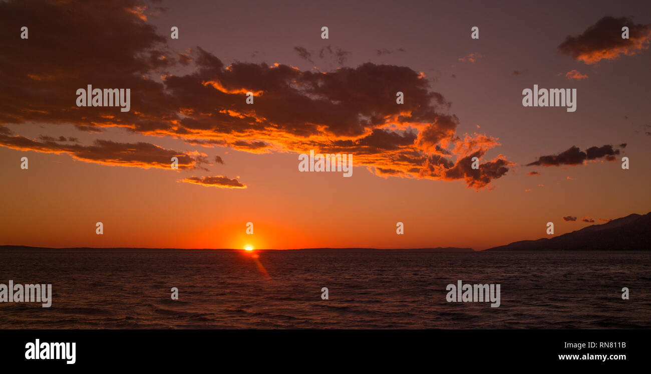 Beautiful sunset seascape with clouds in Paklenica Croatia Stock Photo