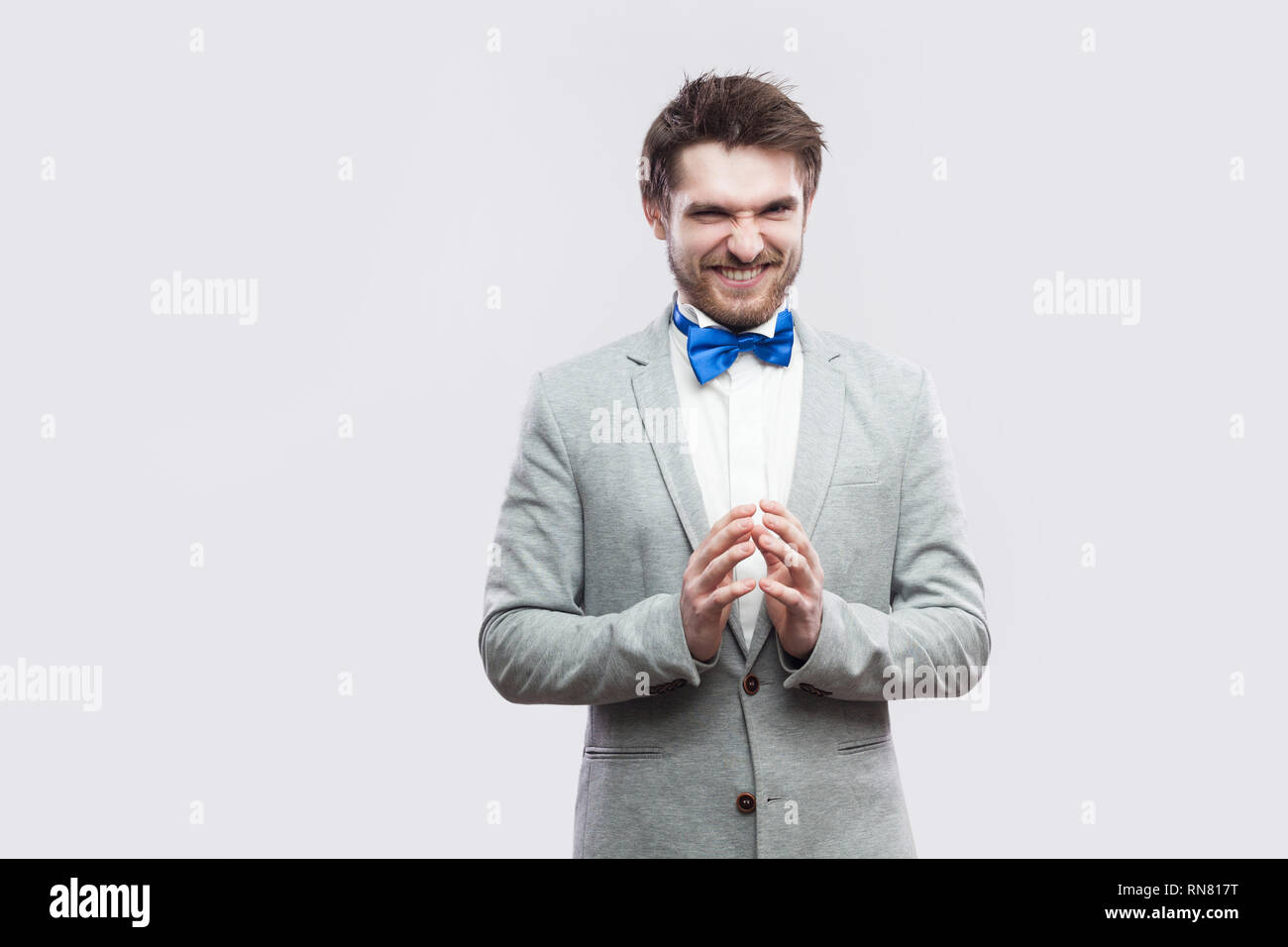 gray suit blue bow tie