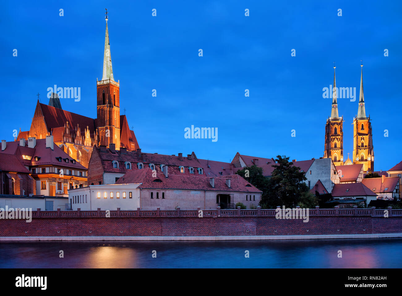 City of Wroclaw at dusk in Poland, Ostrow Tumski skyline with Church of ...