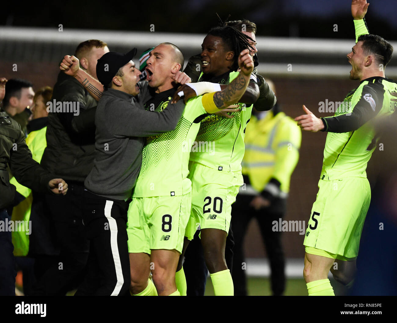 Celtic captain Scott Brown celebrates with the Celtic fans after he scores  his side's first goal of the game during the Ladbrokes Scottish Premiership  match at Rugby Park, Kilmarnock Stock Photo -