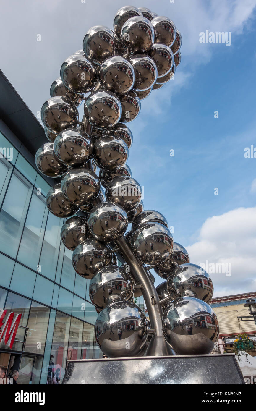 A modern, contemporary artwork monument consisting of shiny silver spheres  on Beidgewater Way in Windsor, Berkshire, UK Stock Photo
